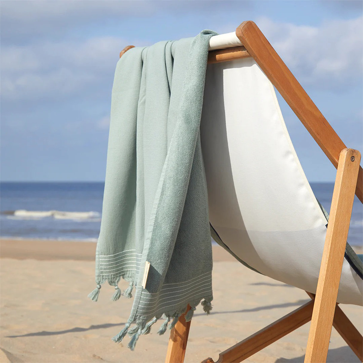 prosop de plaja horeca pe un sezlong